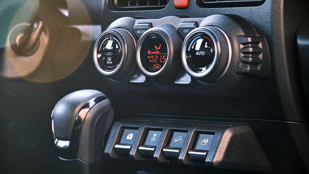 Power window buttons moved to the central